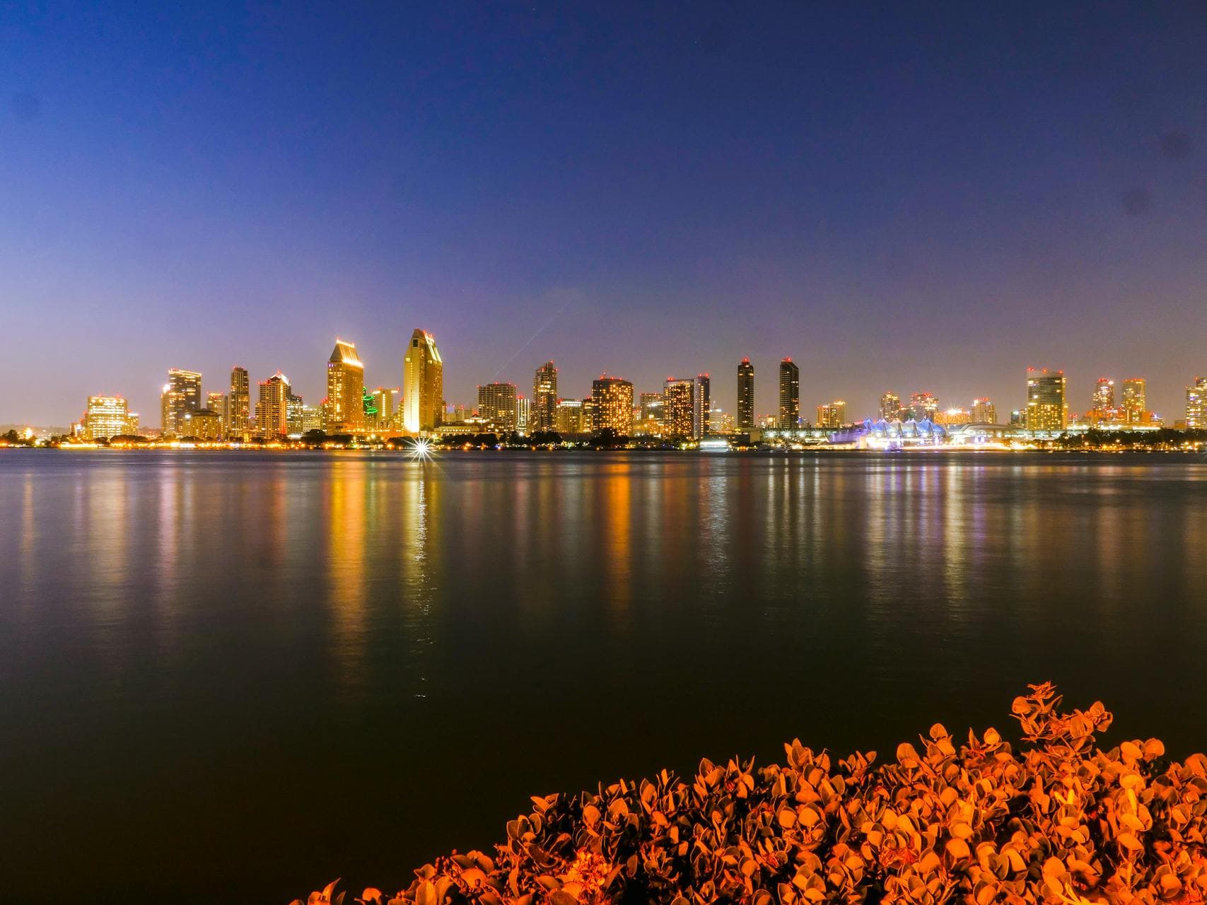 San Diego California home loans - downtown skyline at night from Coronado